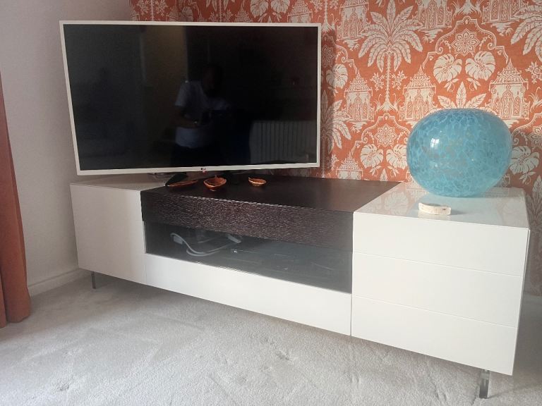 White and dark wood TV unit