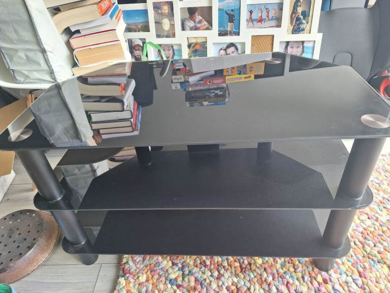 Free black glass tv stand