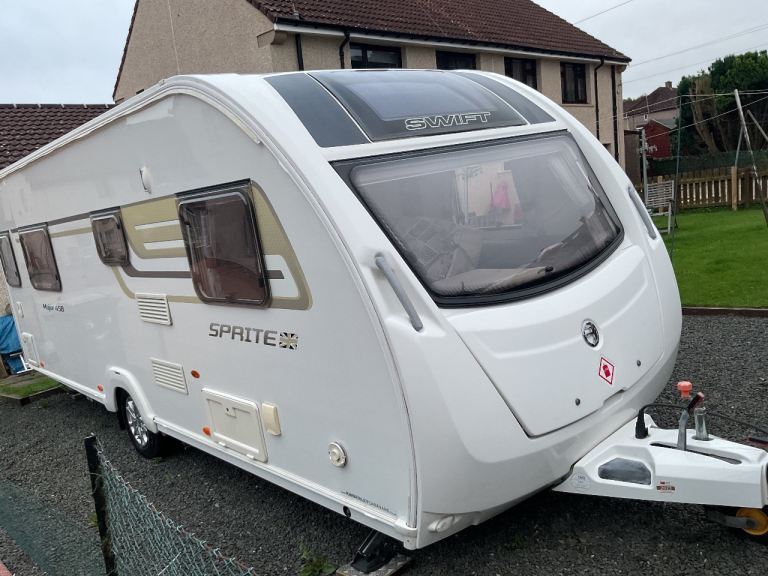 2015 Swift Sprite major 4EB with motor mover and awning.