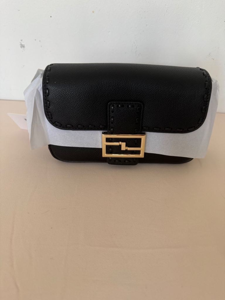 Long and son minimalistic Stylish Black Crossbody Handbag with Gold Detail – Brand New