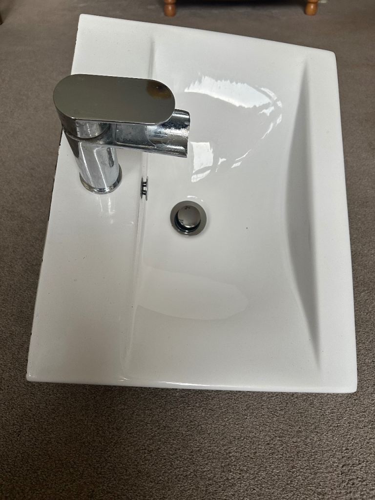 Hand basin for cloakroom