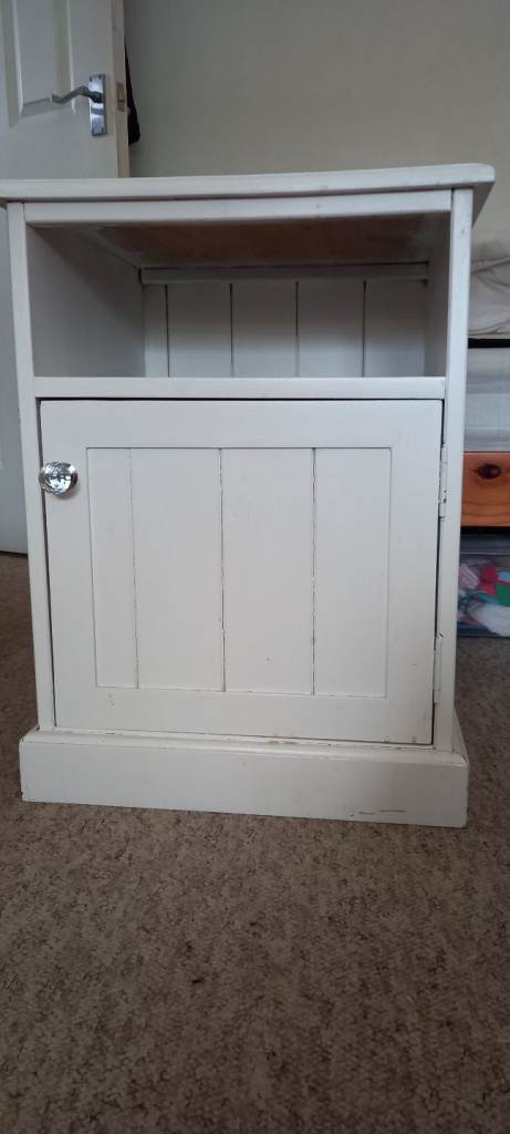 White wooden bedside cabinet