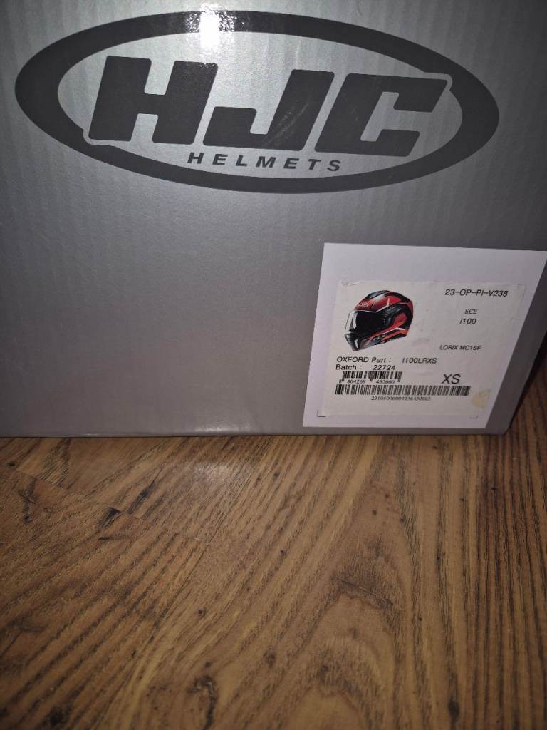 Motorbike helmet and intercom. Size xs xs.