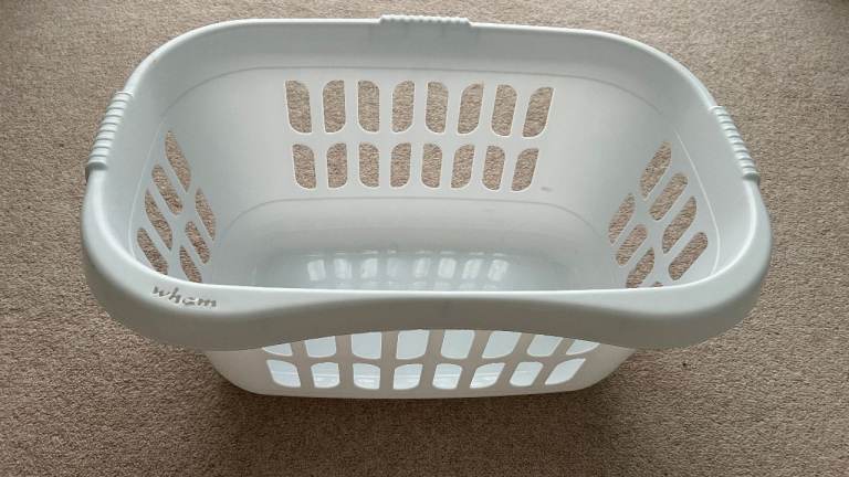 white plastic laundry basket