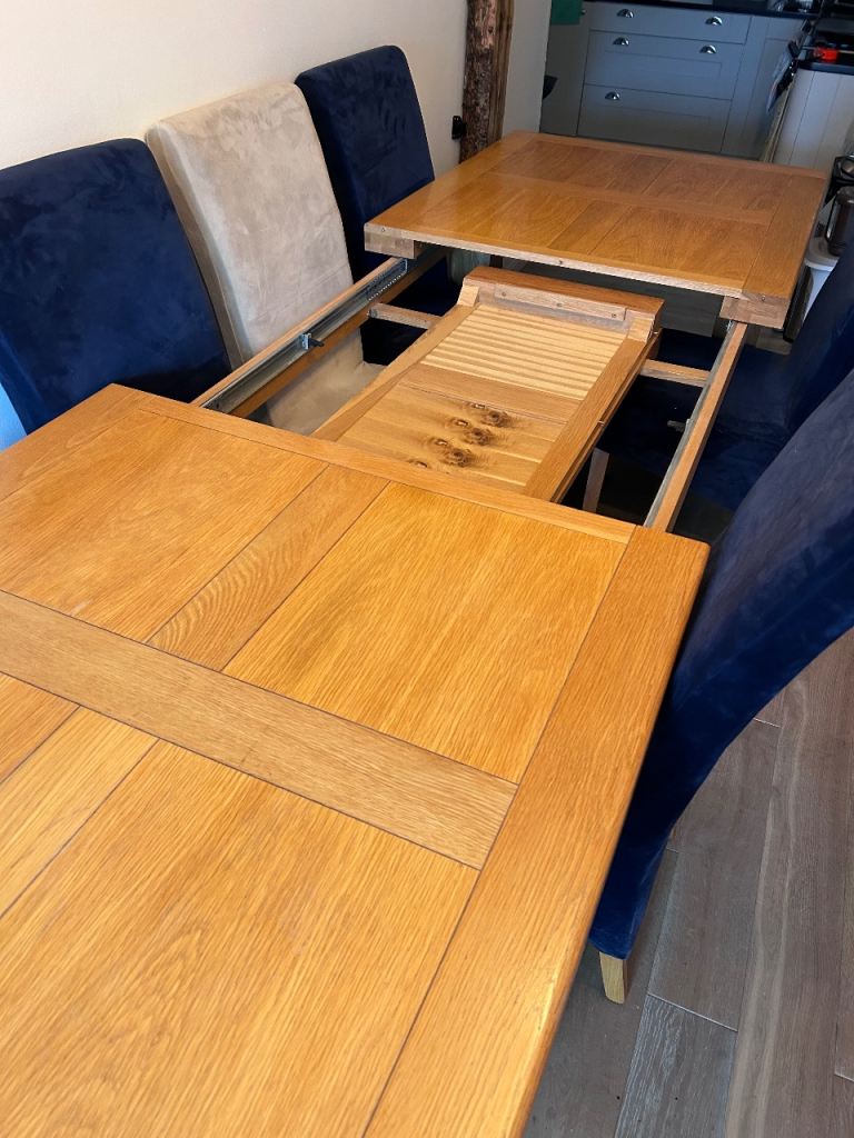 Extending oak dining table 6-12 seater 