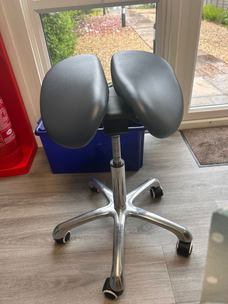 Offers welcome. Nearly new saddle stool for dentist, physio, beautician etc