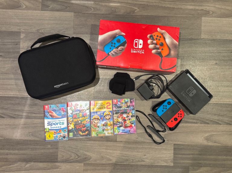 Nintendo Switch V2 with games, case and original box 