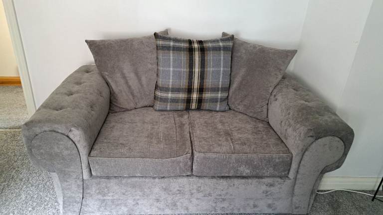 Cosy Grey Fabric Two-Seater Sofa with Tartan Cushion – Good Condition