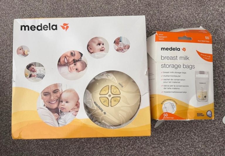 Medela Swing Breast Pump with Medela breast milk storage bags