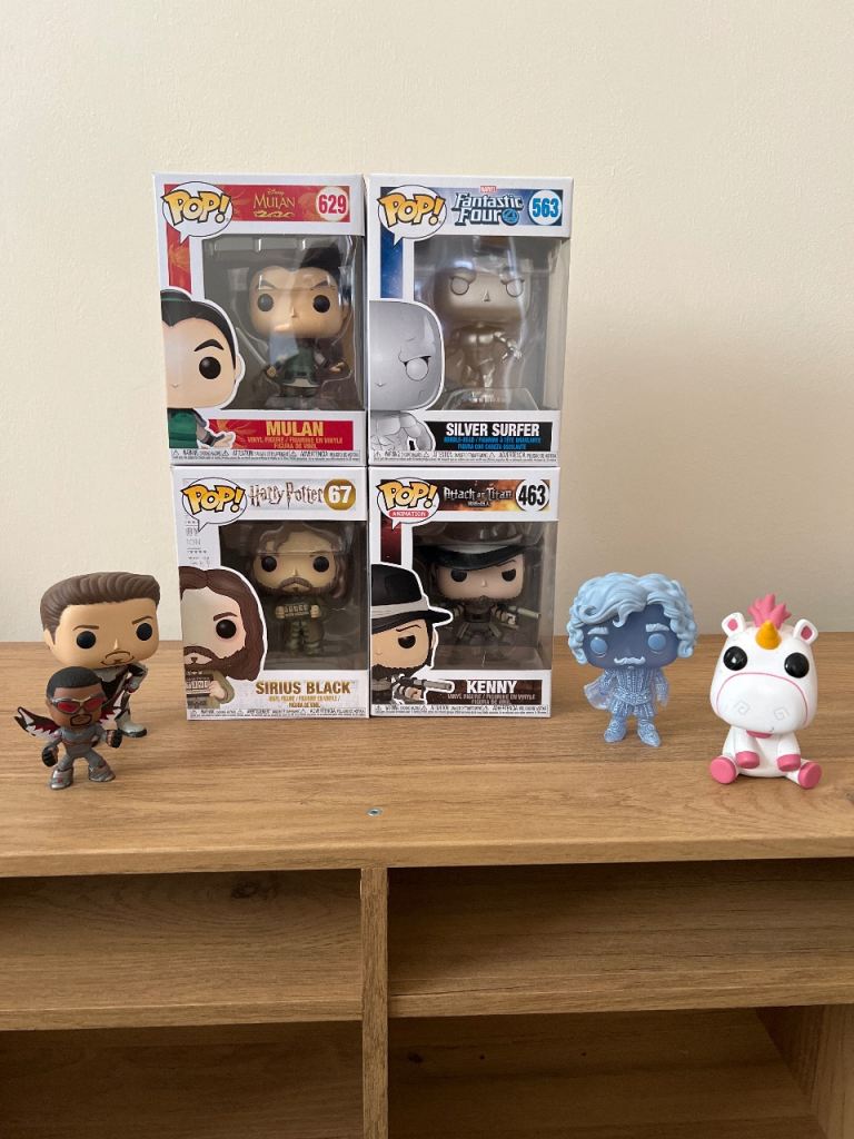 4 boxed and 3 unboxed Funko Pops