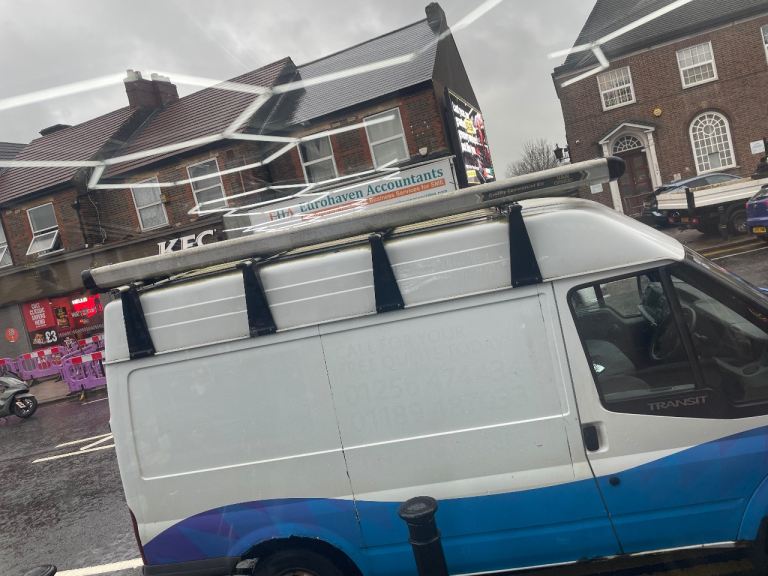 Van guard roof rack and twin pipe holders 