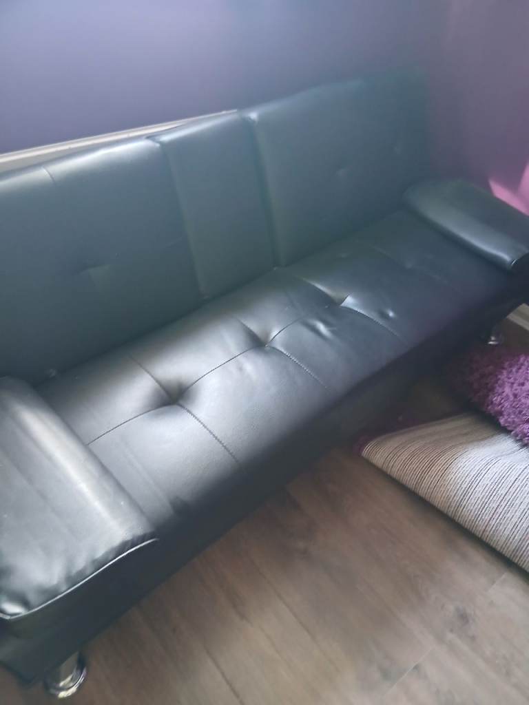 Sofa bed with drinks holder 