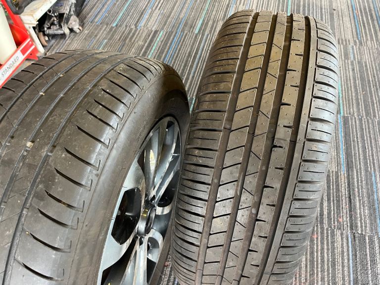 2 Nissan alloy wheels 