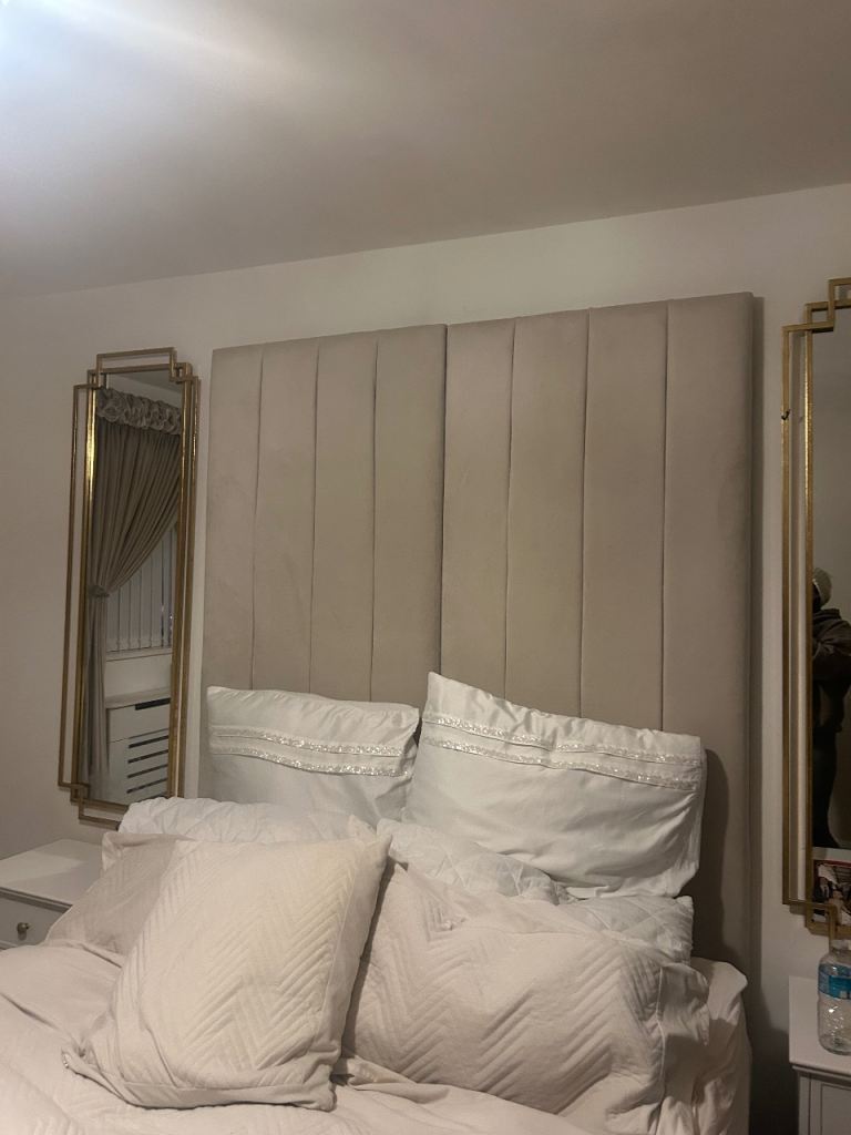 Wall mounted headboard and divan base double bed 
