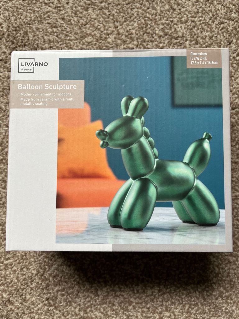 Green balloon dog ceramic sculpture 