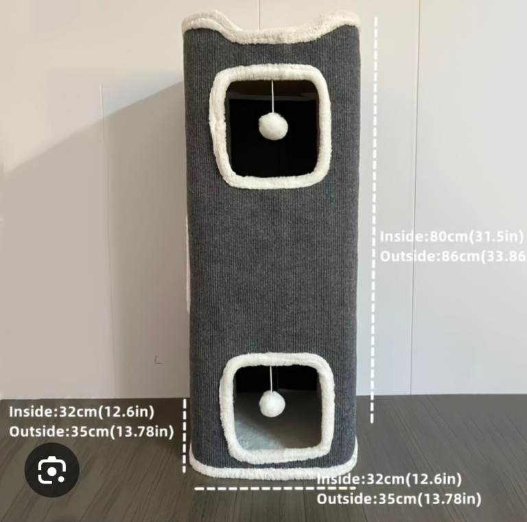A new cats 3 tier play station with pom pom balls the measurements are enclosed .