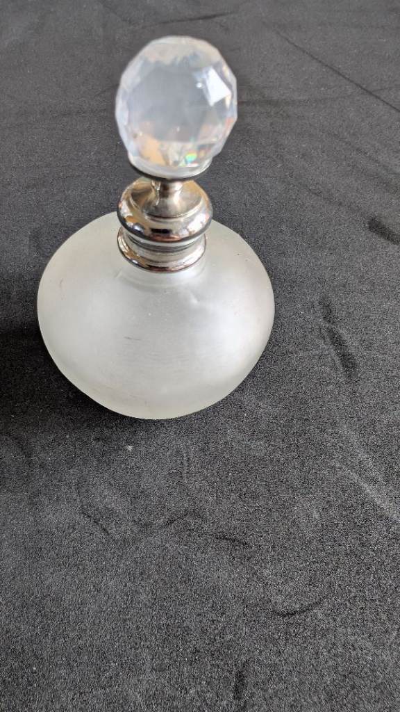 Small frosted glass perfume bottle