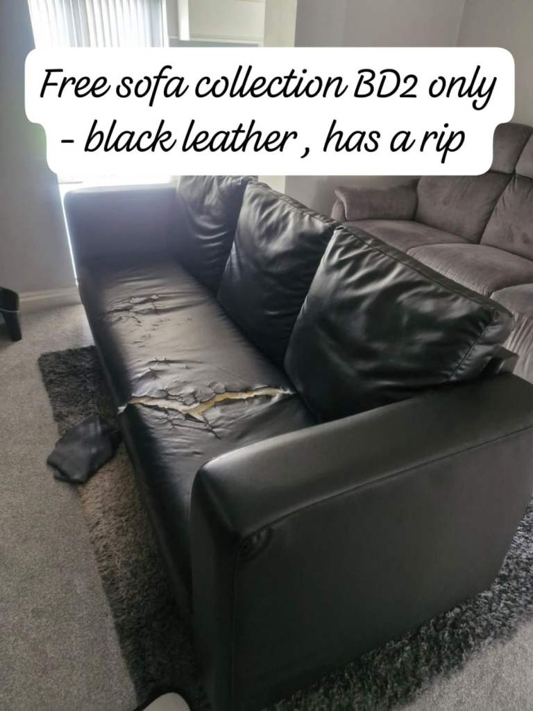 Black Leather Sofa – Has a Rip, Fair Condition
