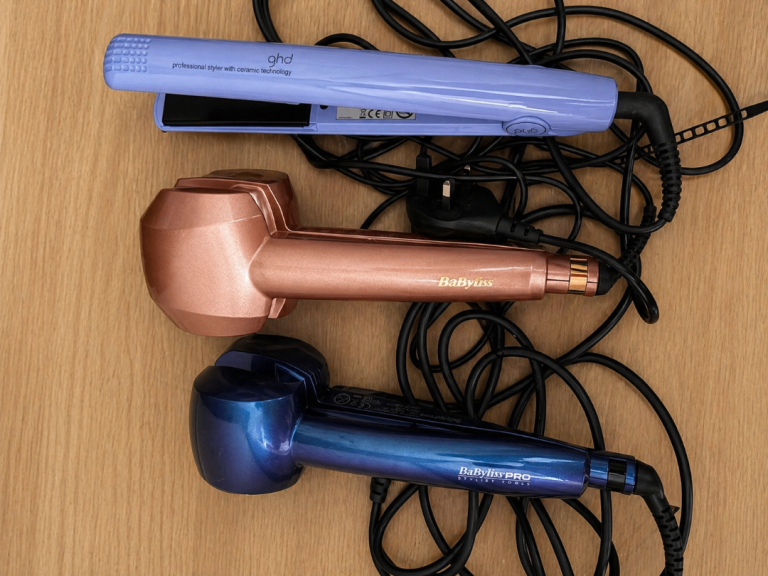 6 hair tools: 2 x Babyliss curlers & 1x GHD & Babyliss straighteners. Curling wand. Mini hairdryer.
