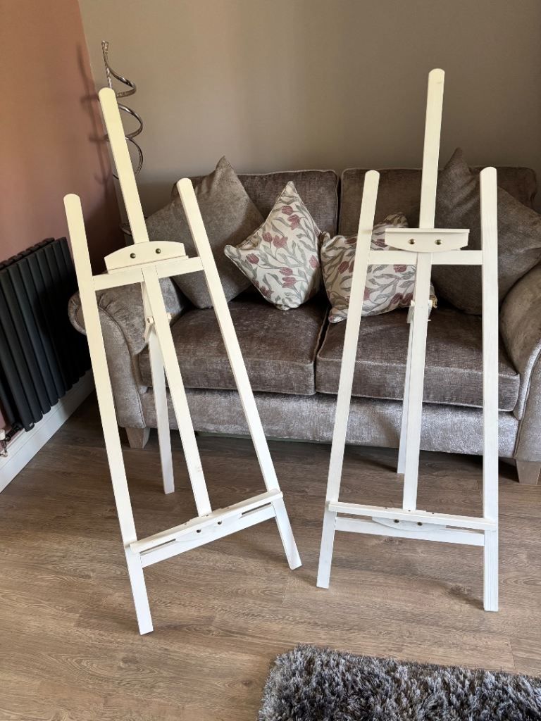 Two white easels 