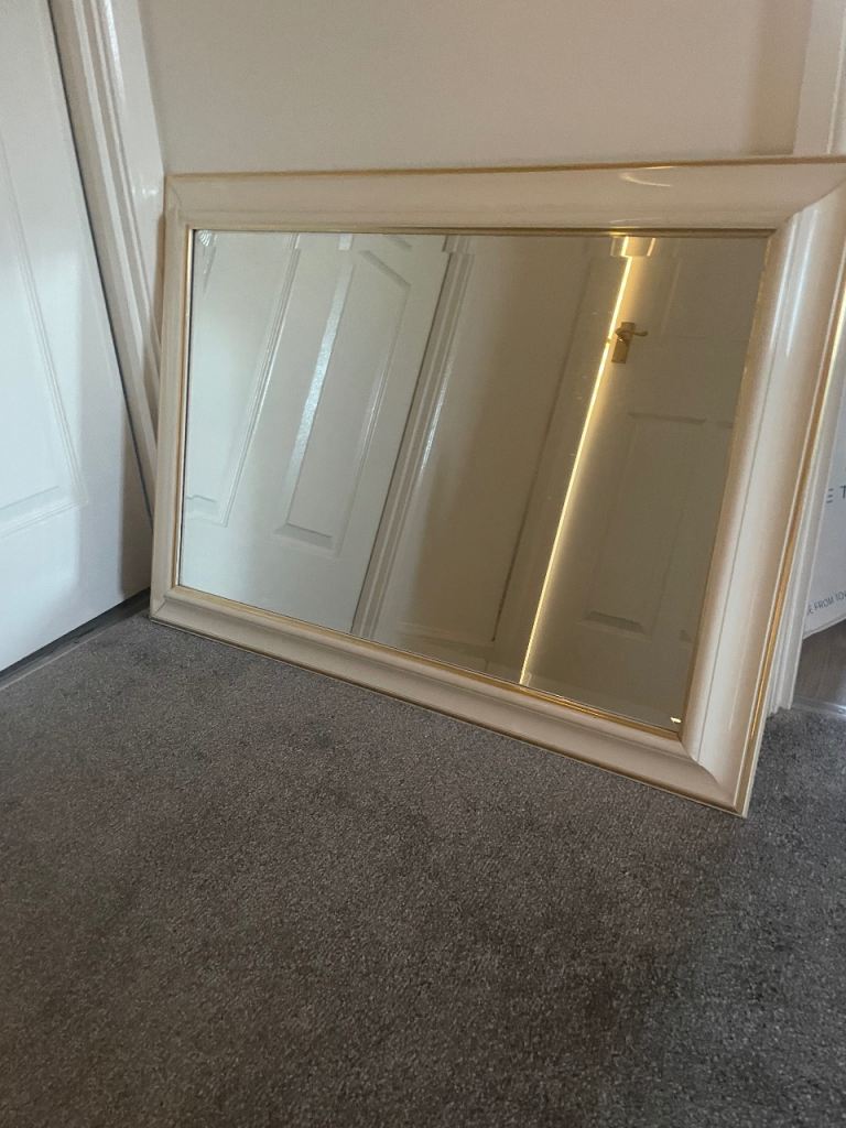 Mirror, high gloss frame with elegant brass beading