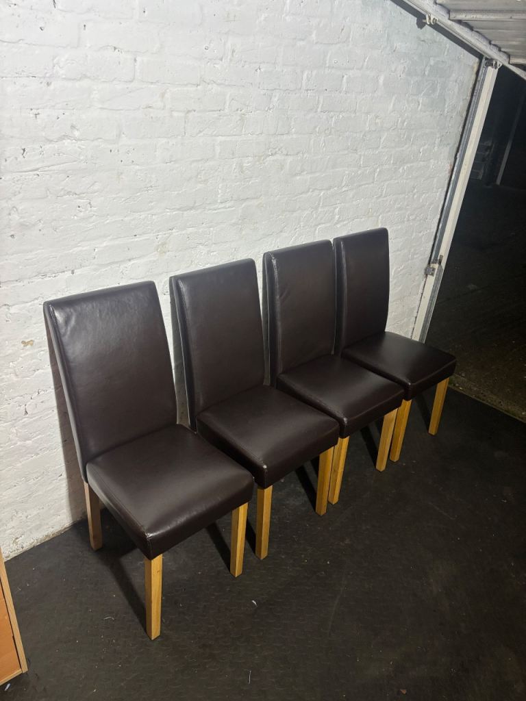 4 dark brown dining chairs