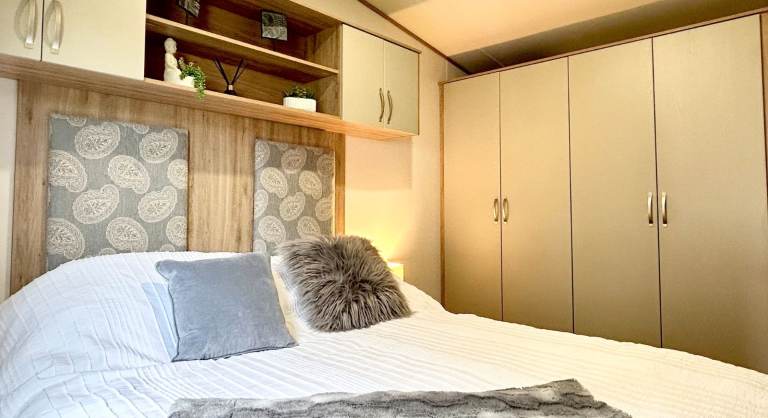 Own a caravan, repaying monthly, near Gt Yarmouth and Lowestoft