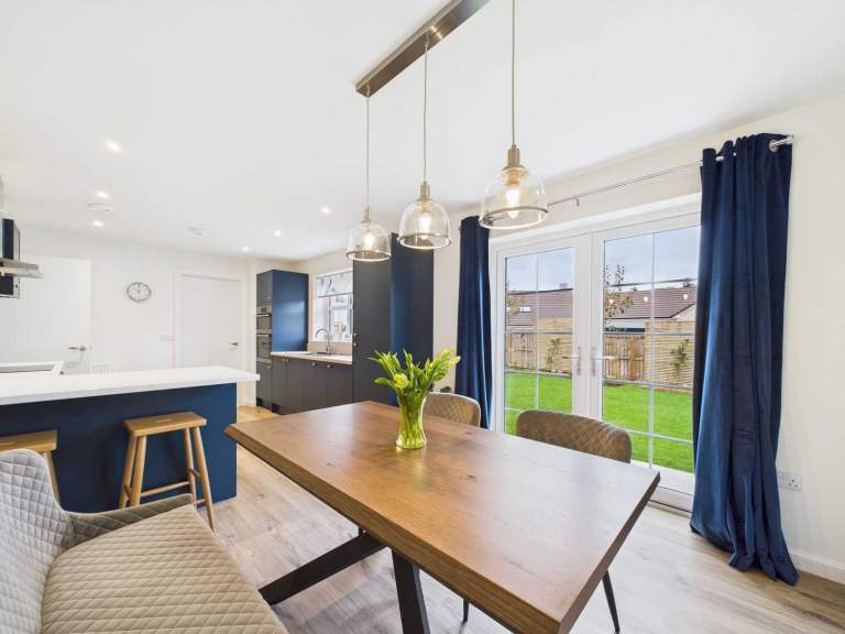 Smoked oak table with grey bench and 2 grey chairs from Sterling