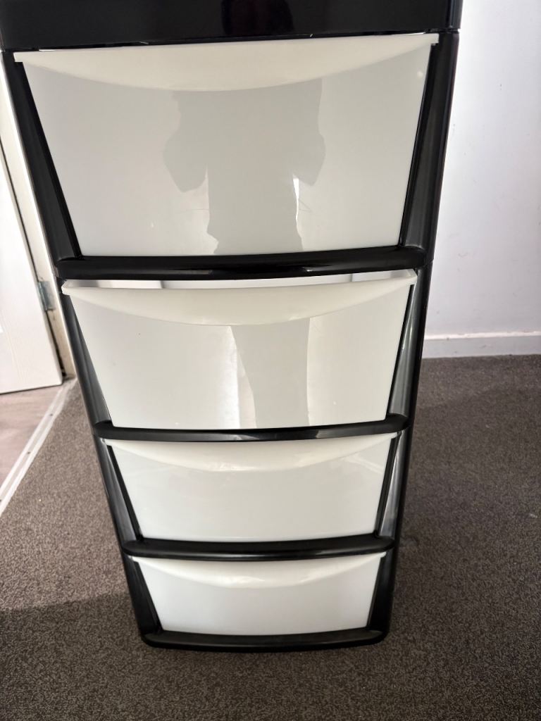 Black and White Plastic Storage Unit with 4 Drawers