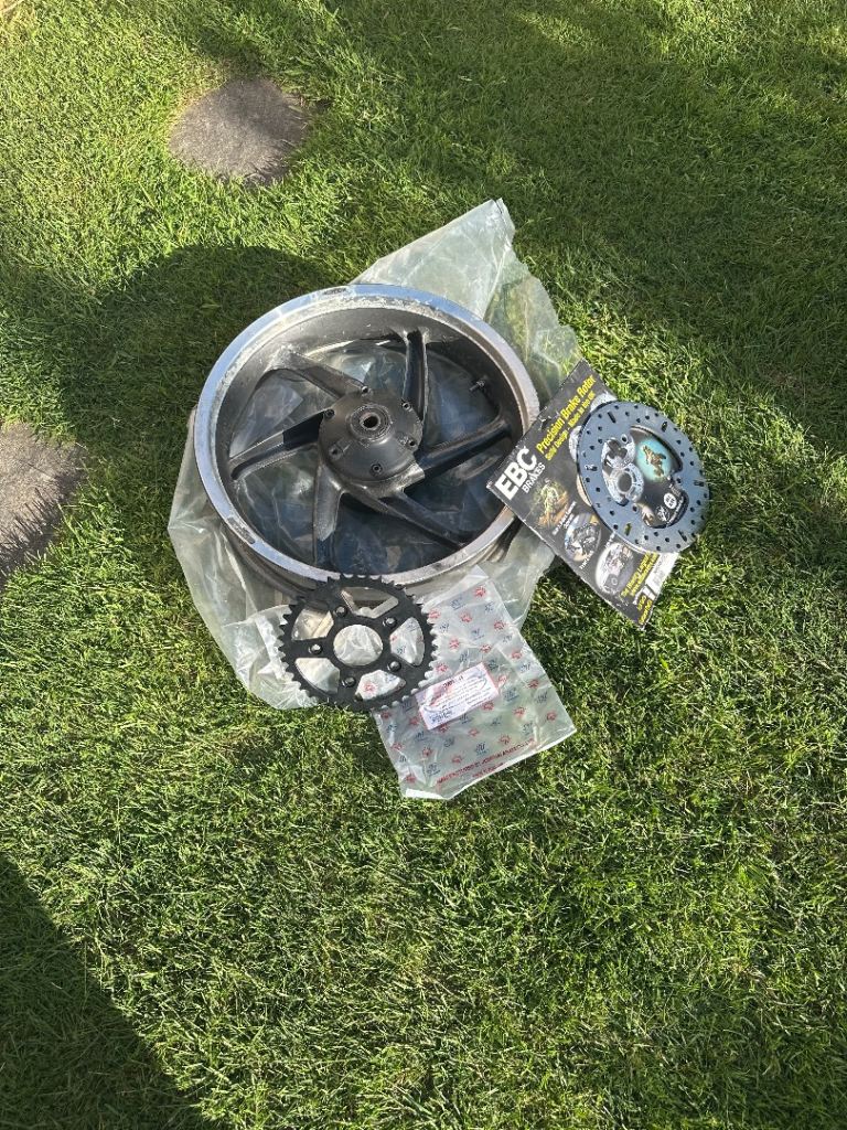 Cagiva planet raptur back wheel with brand new disc and cog