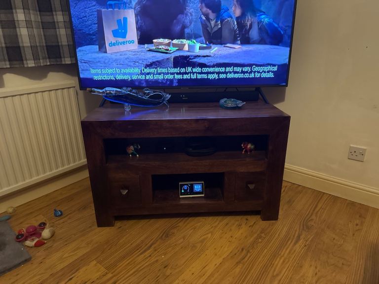 Solid dark wood tv unit