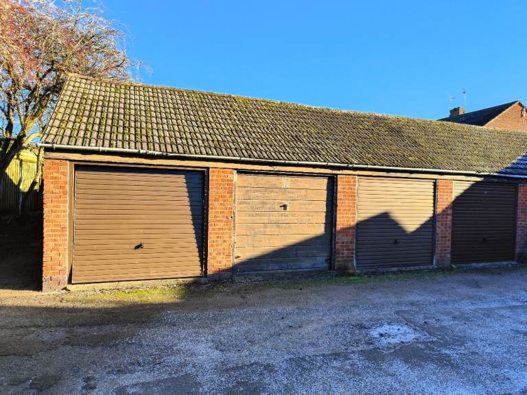 Garage for rent with roof space.