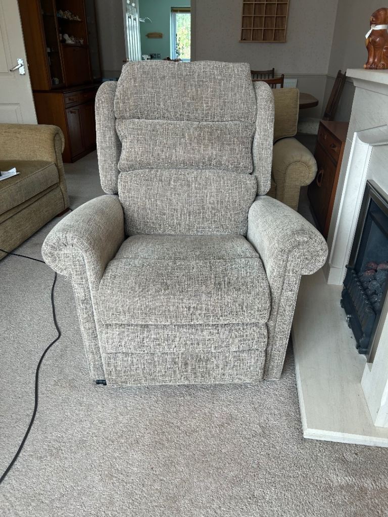 Lift and Recline arm chair in linen oatmeal colour.