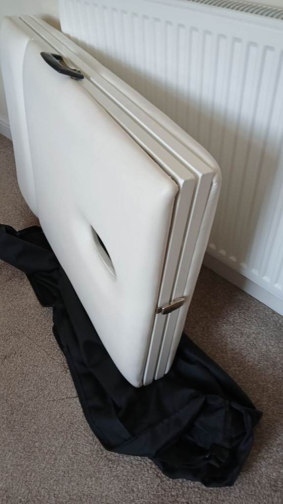 Portable massage table with accessories