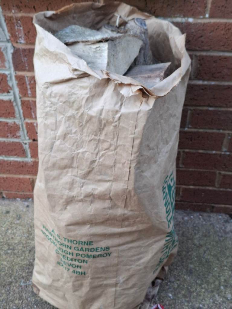 Sack of dry hardwood logs