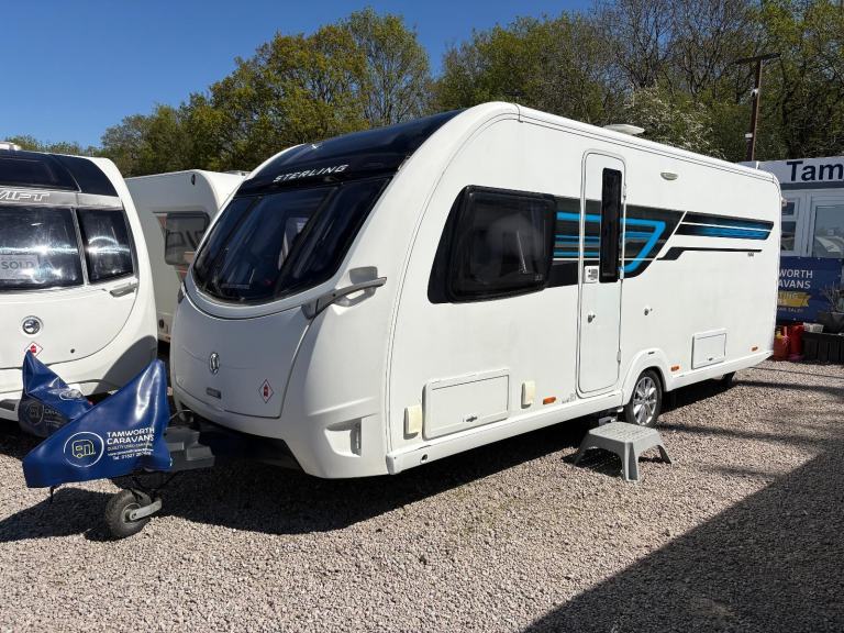 STERLING CONTINENTAL 580 - FIXED TRANSVERSE ISLAND BED CARAVAN + MOTORMOVER 