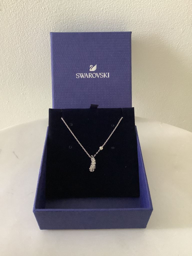 image for Brand new genuine Swarovski Crystal mini feather necklace pendant in box ‘naughty & nice’