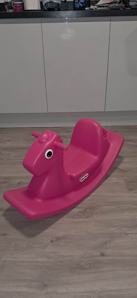Little tikes pink rocking horse.