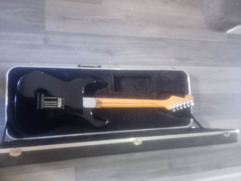 Made in Japan Squier Stratocaster with hardcase.