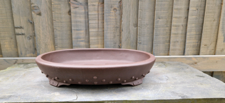 Unglazed ceramic bonsai tree pot