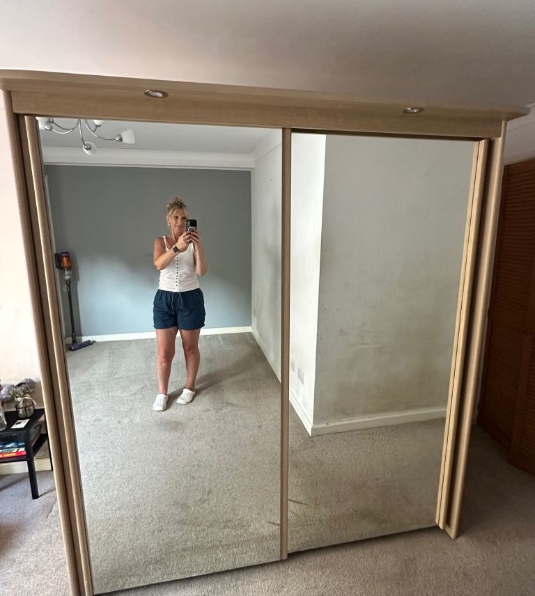 Sliding Mirrored Wardrobe – Light Wood Finish, Good Condition