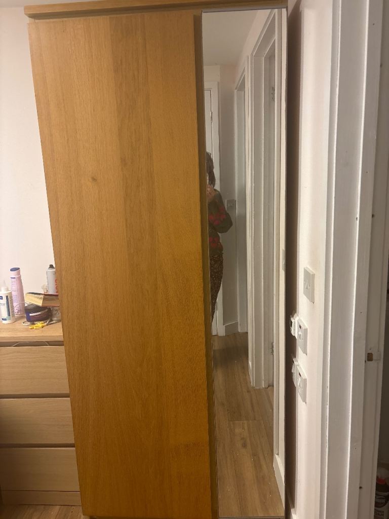 Single wardrobe with mirror, drawers and hanging space