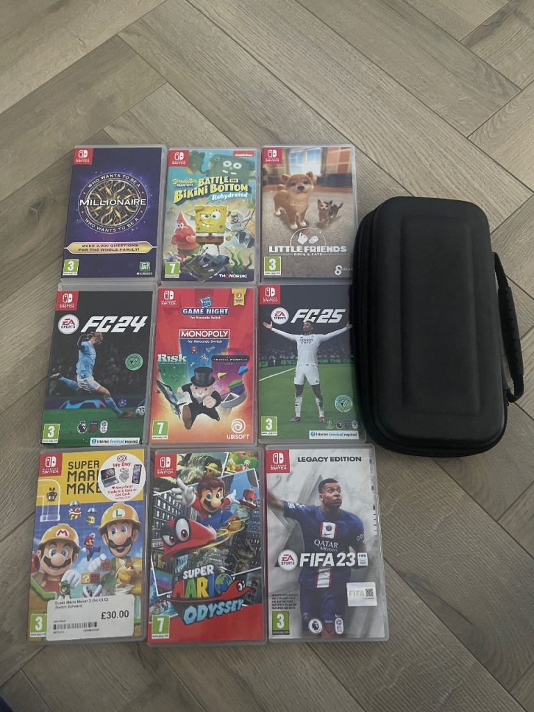 9 Nintendo switch games, including carry case for console and games 