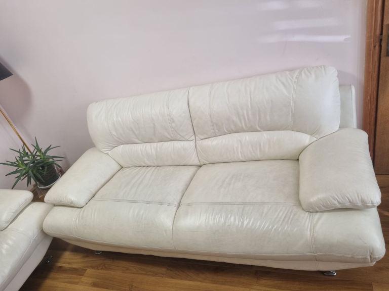 Cream leather sofas