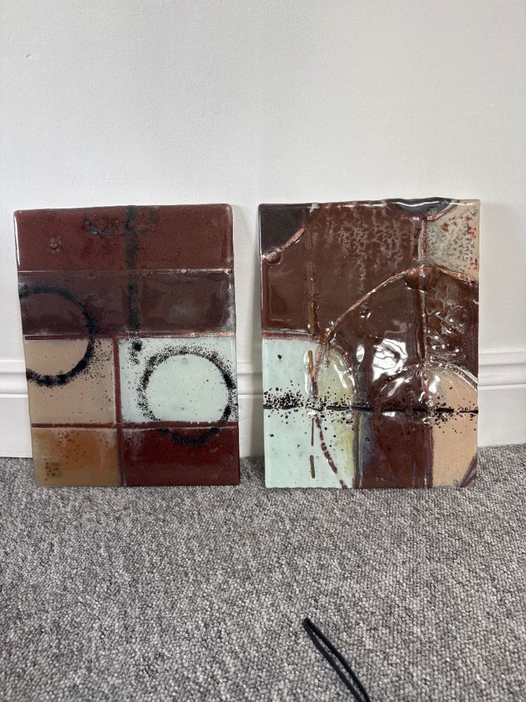 2 Brown/Cream Glass Wall Art pieces.  Signed 
