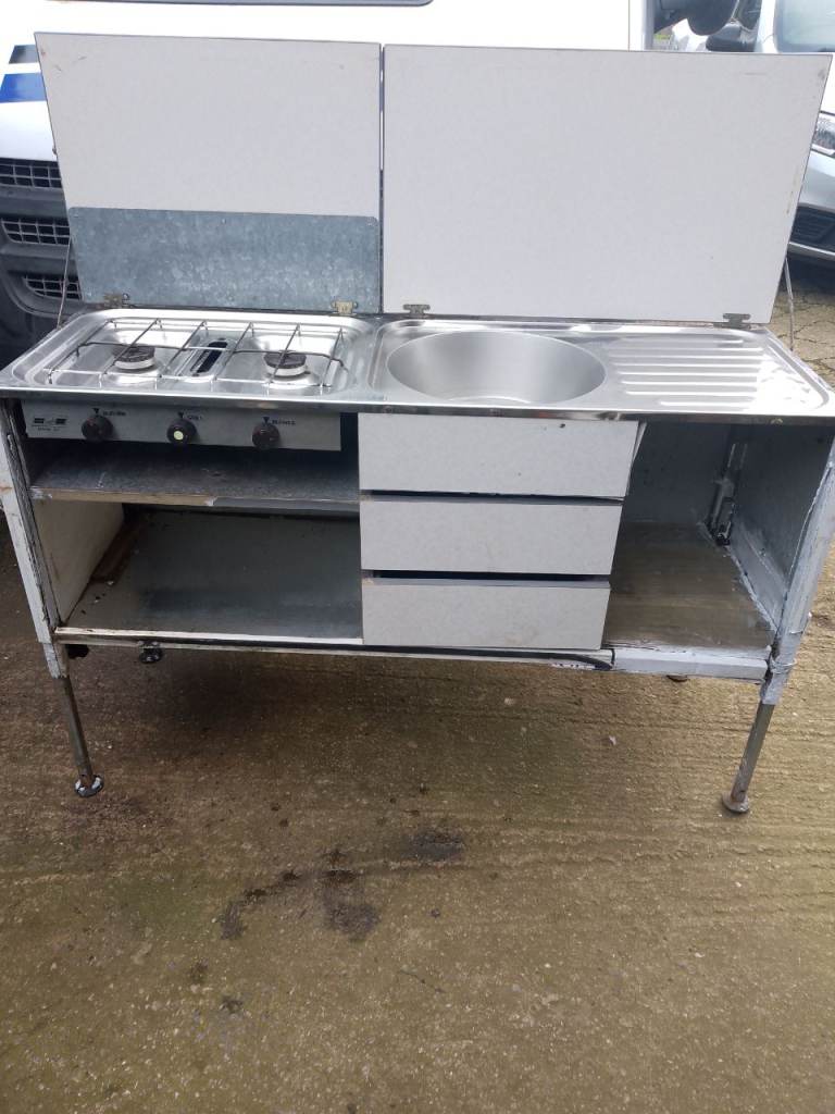 Camping cooker off trailer tent 