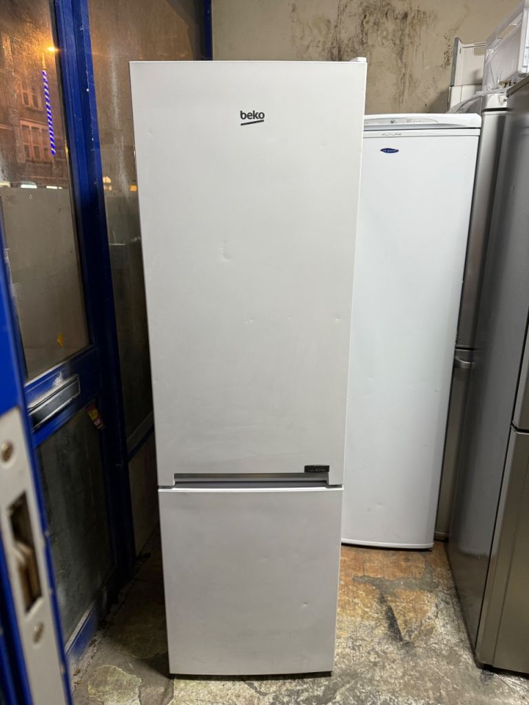 Beko fridge freezer height is 185 cm width is 55 cm very beautiful condition 
