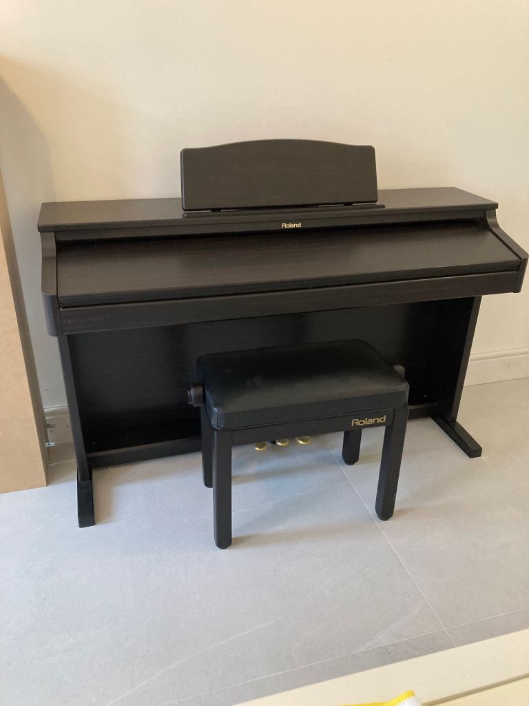 Roland piano with headphones 