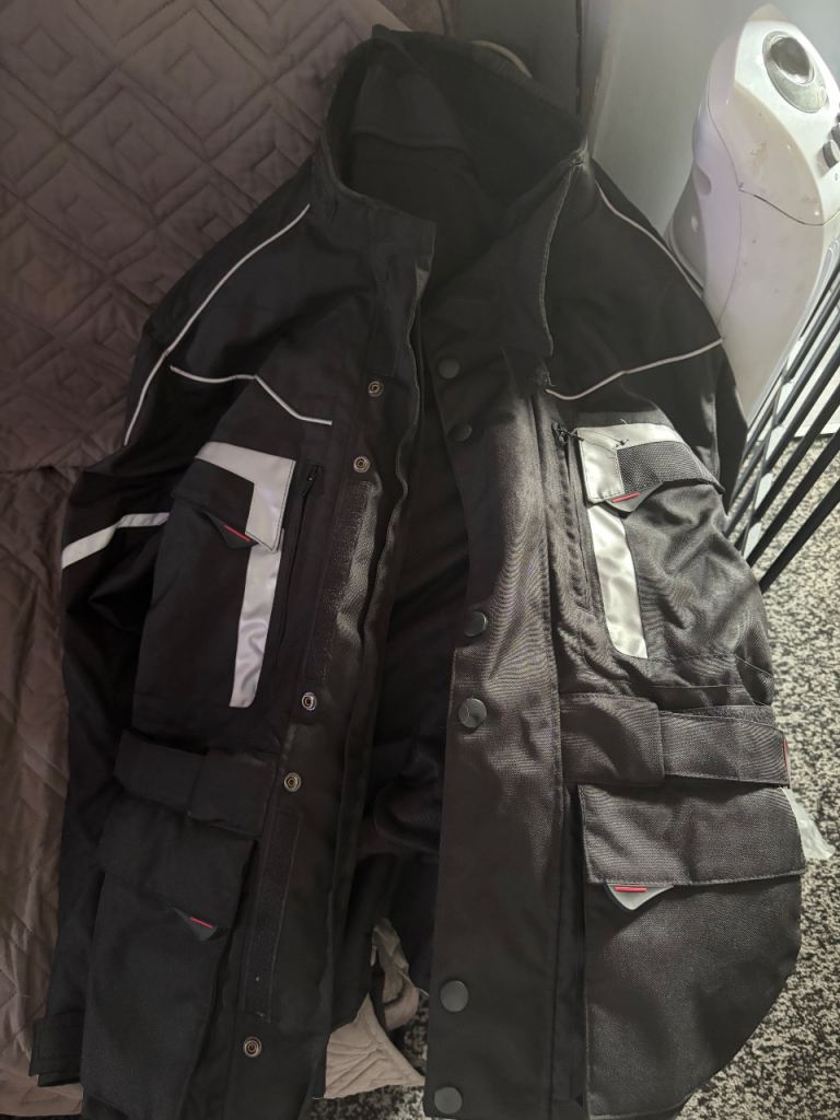 Motorbike jacket trousers and gloves