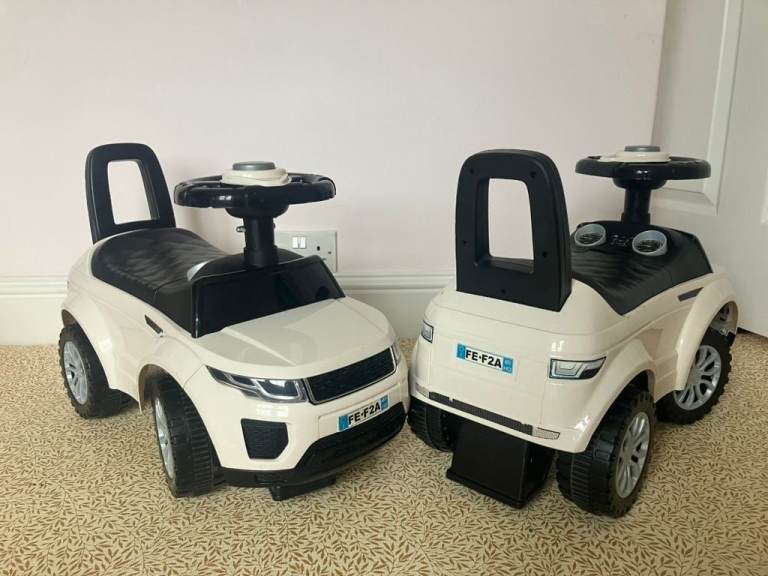 Range Rover Evoque-style "foot-to-floor" ride-on cars X 2 (happy to sell separately)